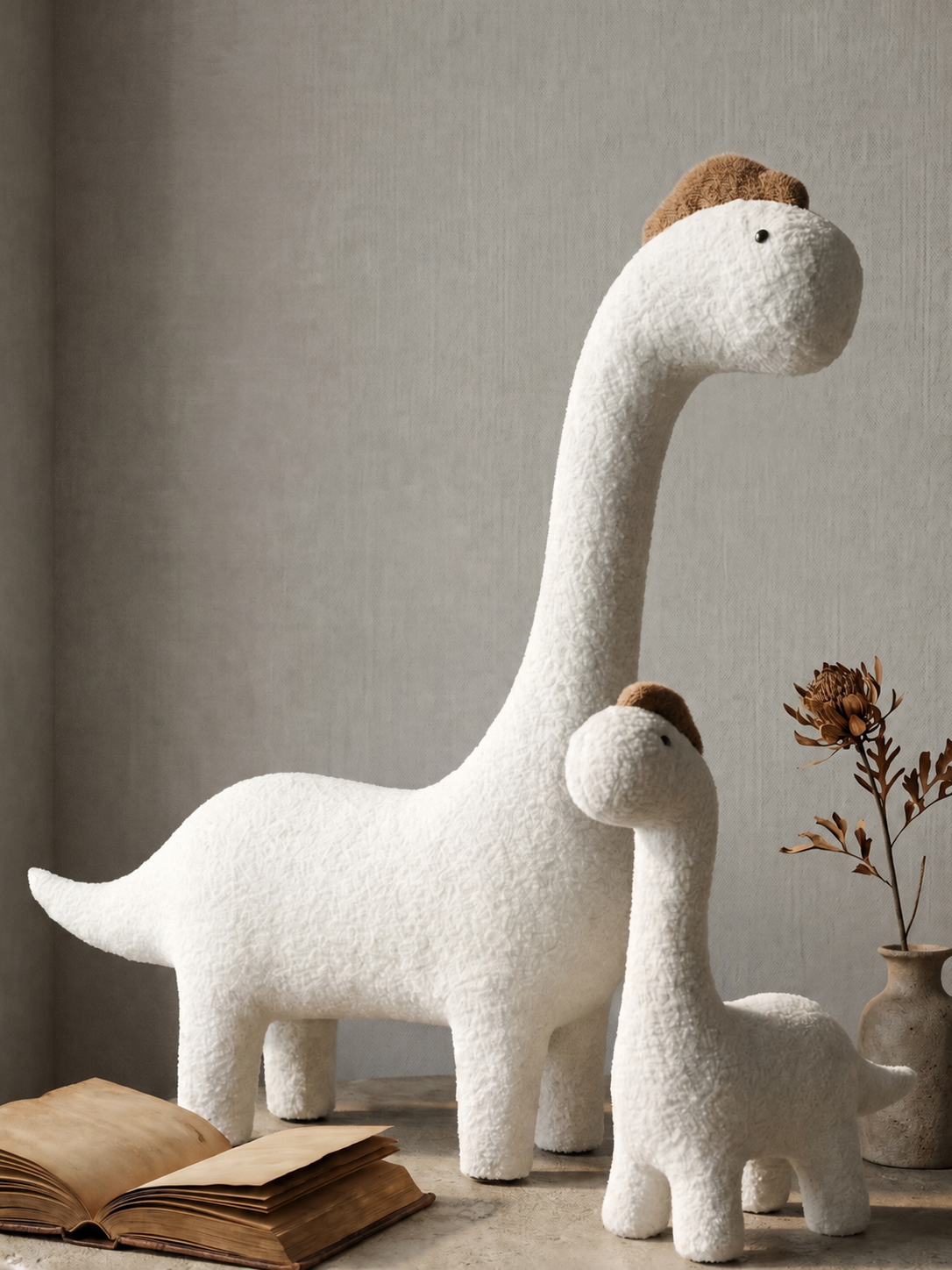 Two white dinosaur cat tree with brown heads on a neutral background